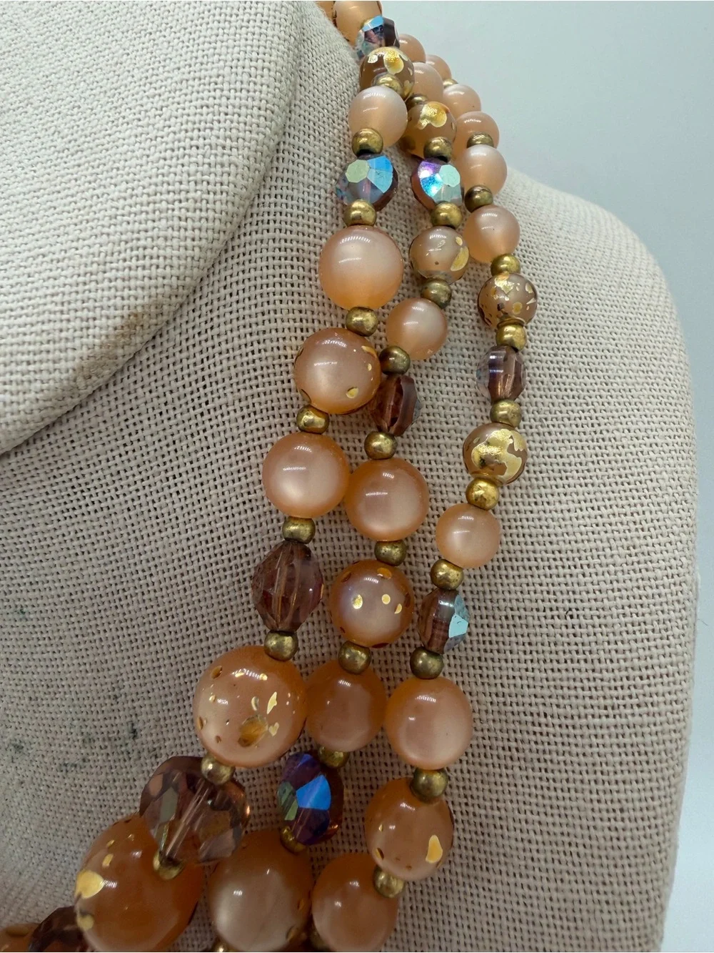 Vintage AB rhinestone and copper color plastic triple layer beaded necklace